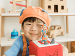 Child Playing With Blippi Tonie