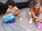 Child Playing With The Listen & Go Bag - Blue Stargazing