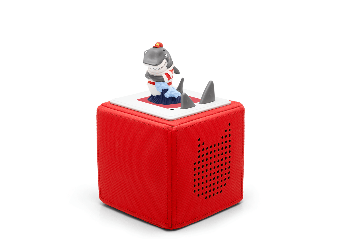 Full view of a Clark the Shark Tonie on a red Toniebox
