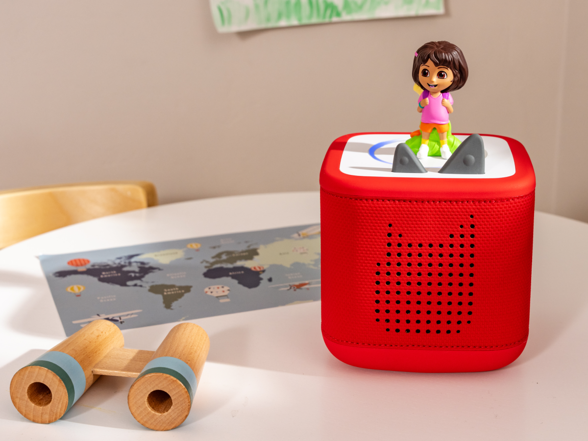 Child Playing With Dora Tonie Audio Figurine And Toniebox 2