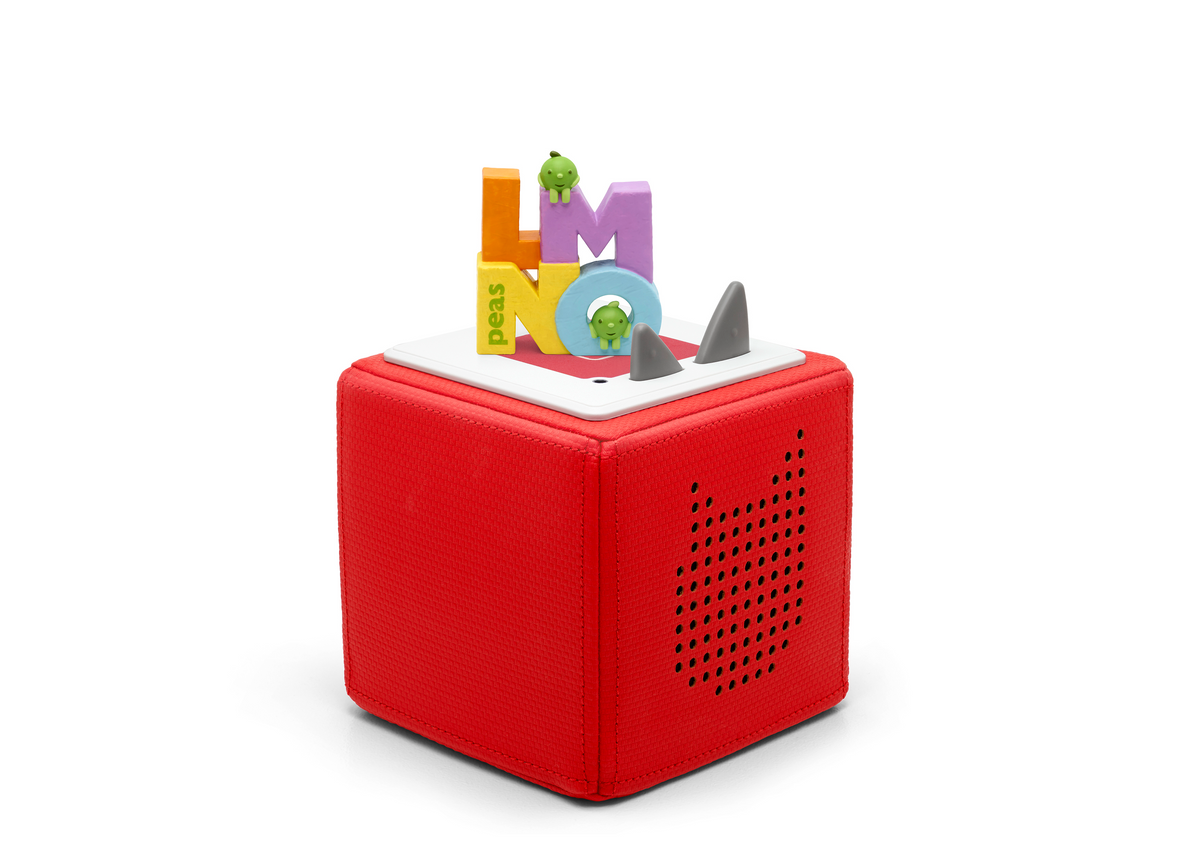 Full view of a LMNO Peas Tonie on a red Toniebox