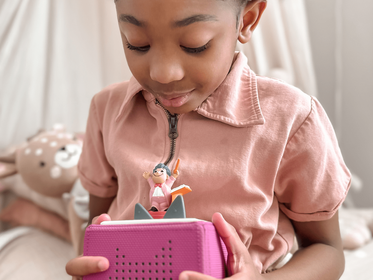 Child Playing With Maestro Tonie