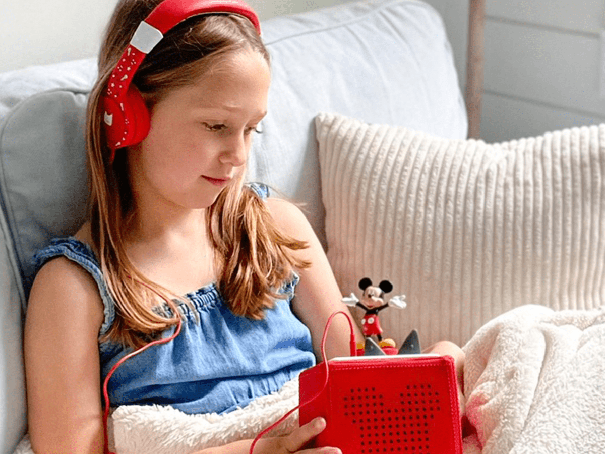 Child Playing With Disney Mickey Mouse Tonie