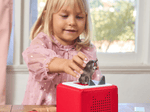 Child Playing With Peter & The Wolf Tonie