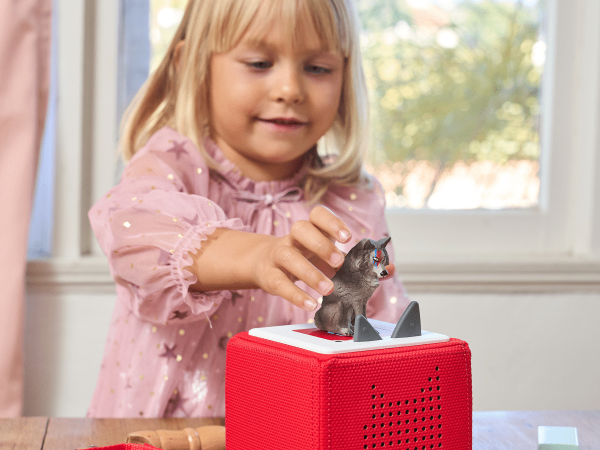 Child Playing With Peter & The Wolf Tonie