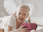 Child Playing With Disney Tinker Bell Tonie