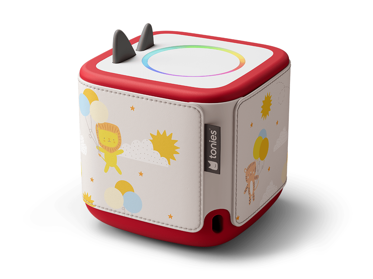 Side view of Toniebox 2 with lion, balloons, sun and clouds on it