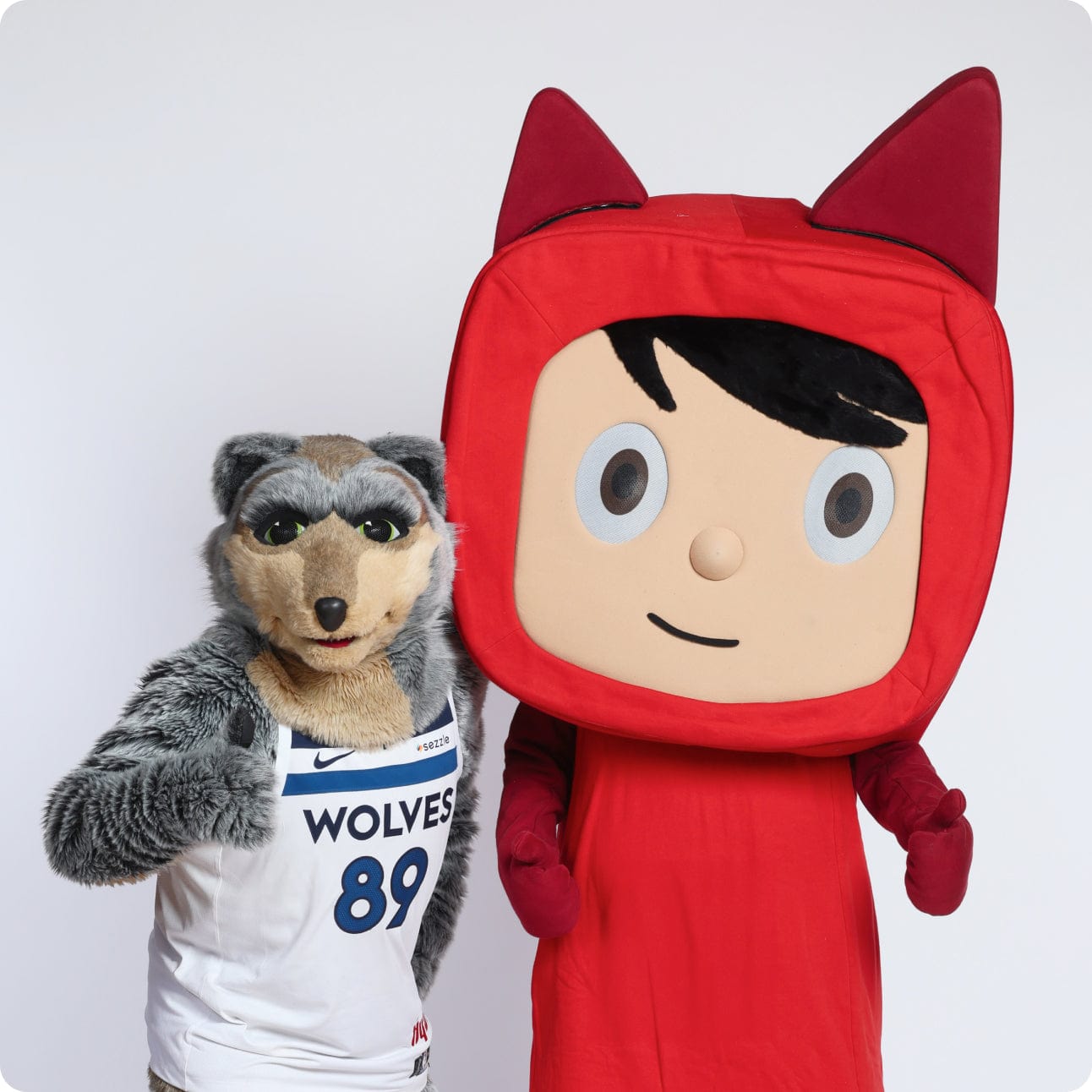 tonies and Timberwolves mascots giving thumbs up