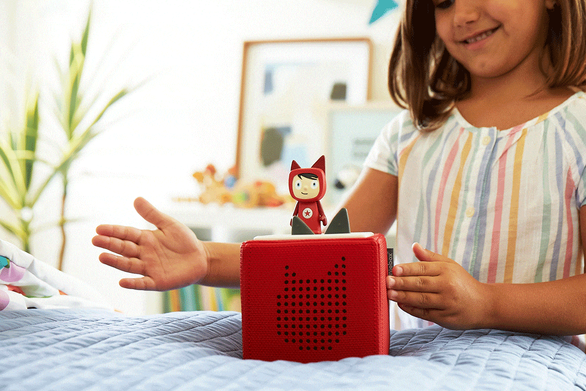 Gif of a girl playing with a Tonie and Toniebox