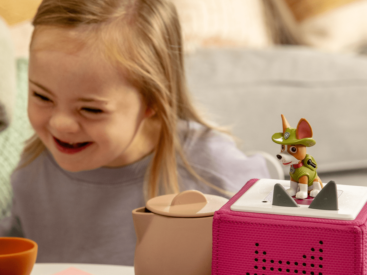 Child Playing With Paw Patrol Tracker Audio Figurine And Toniebox 2
