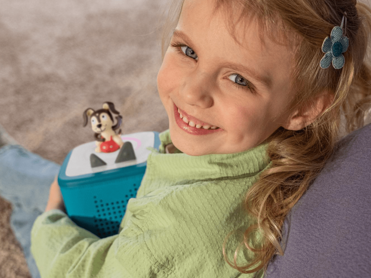 Child enjoying a Tonie and Toniebox 2, an audio player for kids