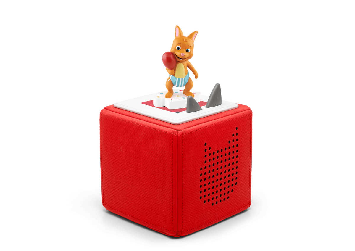 Full view of Word Party Tonie on a red Toniebox