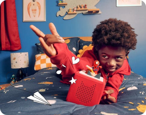 Child deep into an audio adventure with their Toniebox