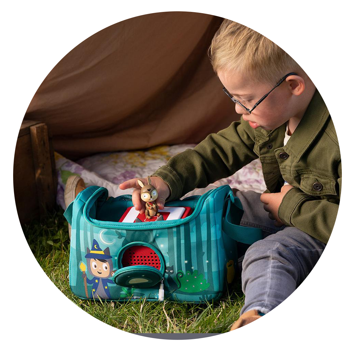Child playing with Toniebox and Tonie in a Listen and Play Bag