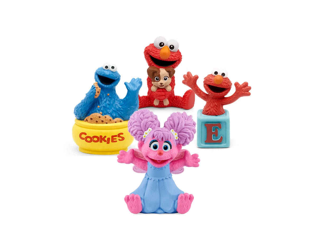 Set of Sesame Street figurines including Cookie Monster, Elmo, and Abby Cadabby on a white background.