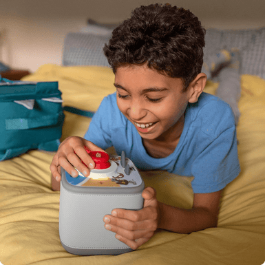 Child playing a Tonieplay Game on a grey Toniebox 2