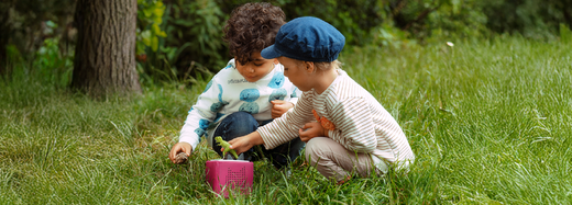 Children enjoying outdoor play with their Toniebox