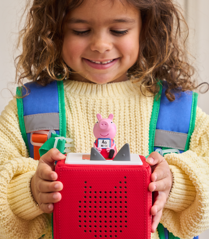 child listening to Peppa Pig for independent play time