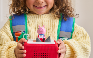 child listening to Peppa Pig for independent play