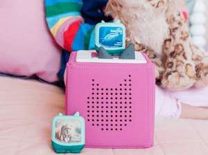 Child Playing With Animal World Record Breakers Audio Figurine And Toniebox 2