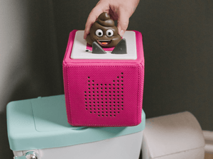 Child Playing With Potty Training Tonie