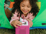 Child playing with Peppa Pig: Peppa's Bedtime Stories Tonie audio figurine and Toniebox 2