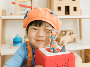 Child Playing With Blippi Tonie