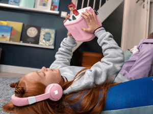 Child Listening To The Toniebox 2 And Tonie With Cloud Pink Bluetooth Headphones For Kids