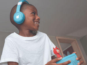 Child Listening To The Toniebox 2 And Tonie With Sky Blue Bluetooth Headphones For Kids