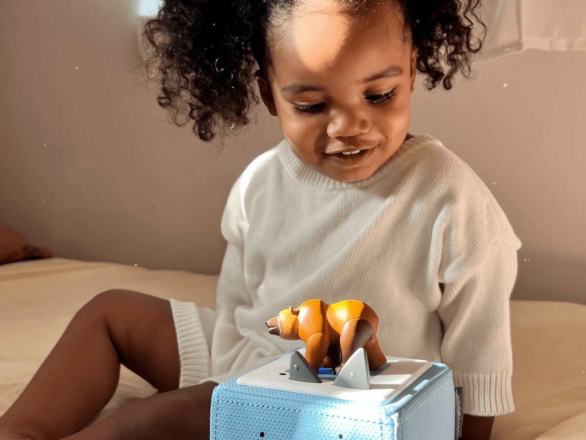 Child Playing With Brown Bear & Friends Tonie