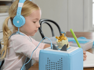 Child Playing With Jurassic World: Camp Cretaceous Tonie