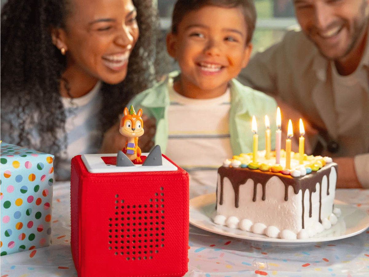 Child Playing With Canciones De Celebracion Tonie Audio Figurine And Toniebox 2