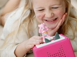 Child Playing With Care Bears: Cheer Bear Tonie