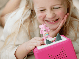 Child Playing With Care Bears: Cheer Bear Tonie