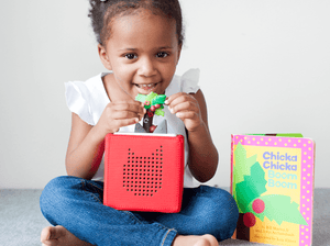 Child Playing With Chicka Chicka Boom Boom Tonie