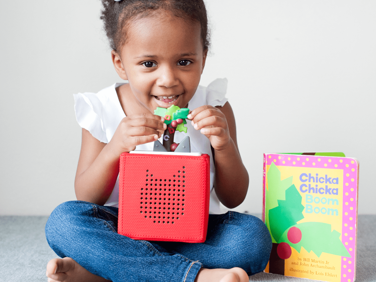 Child Playing With Chicka Chicka Boom Boom Tonie