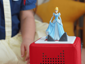 Child Playing With Disney Cinderella Tonie