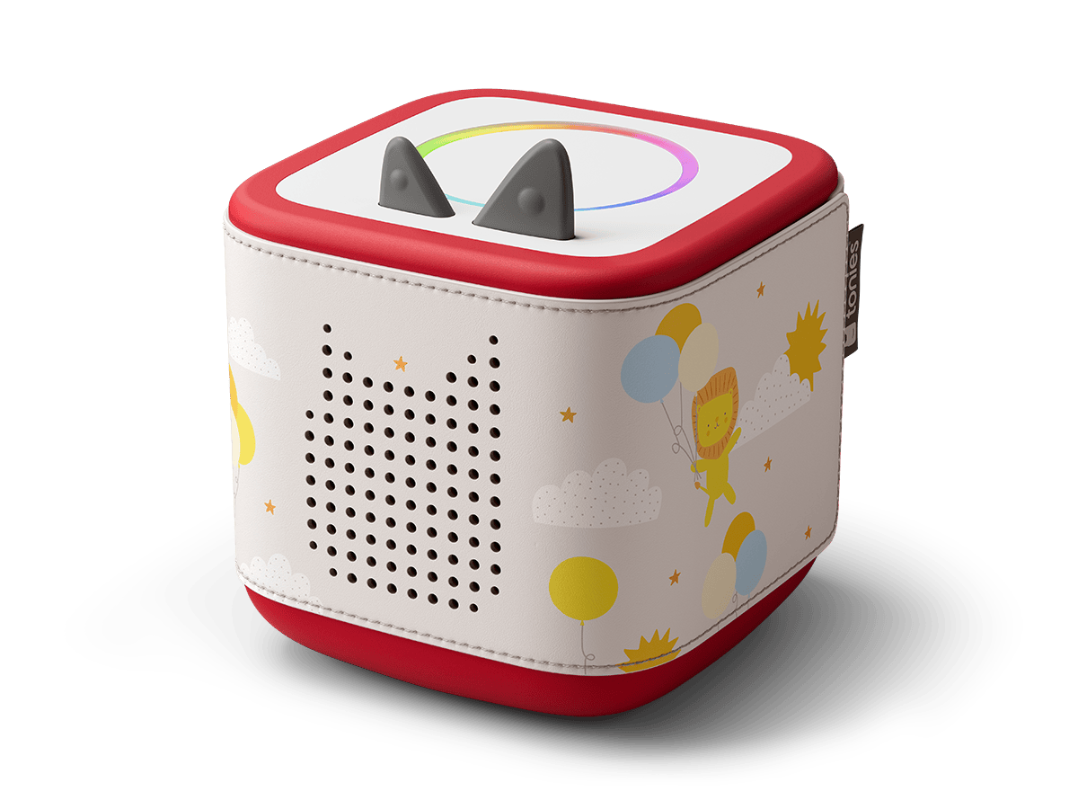 Side view of Toniebox 2 with lion, balloons, sun and clouds on it