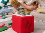 Child Playing With Cocomelon- Cody Audio Figurine And Toniebox 2