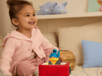 Child Playing With Sesame Street: Cookie Monster Tonie
