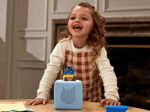 child playing with Sesame Street - Cookie Monster (Spanish)