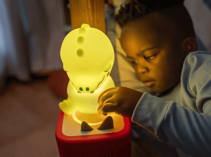 	
Child playing with Sleepy Friends- Sleepy Crocodile Night Light  Tonie audio figurine and Toniebox 2
