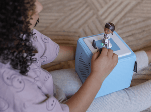 Child Playing With Disney Doc Mcstuffins Tonie