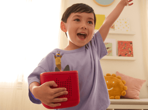 Child Playing With Doggyland Tonie