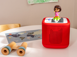 Child Playing With Dora Tonie Audio Figurine And Toniebox 2