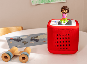 Child Playing With Dora Tonie Audio Figurine And Toniebox 2
