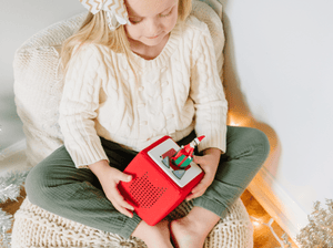 Child Playing With The Elf On The Shelf Tonie