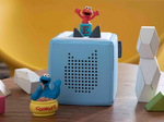Child Playing With Sesame Street: Elmo Tonie