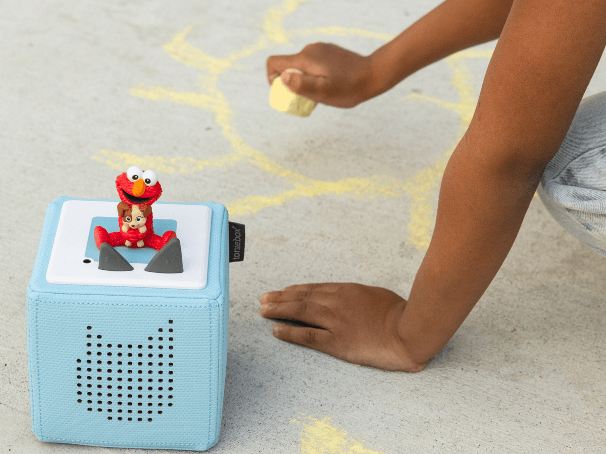 Child Playing With Sesame Street: Elmo & Tango Tonie