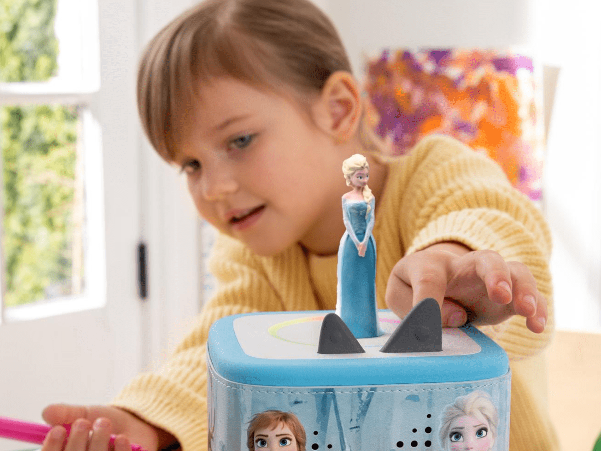 Child Playing With Disney Frozen: Elsa Tonie